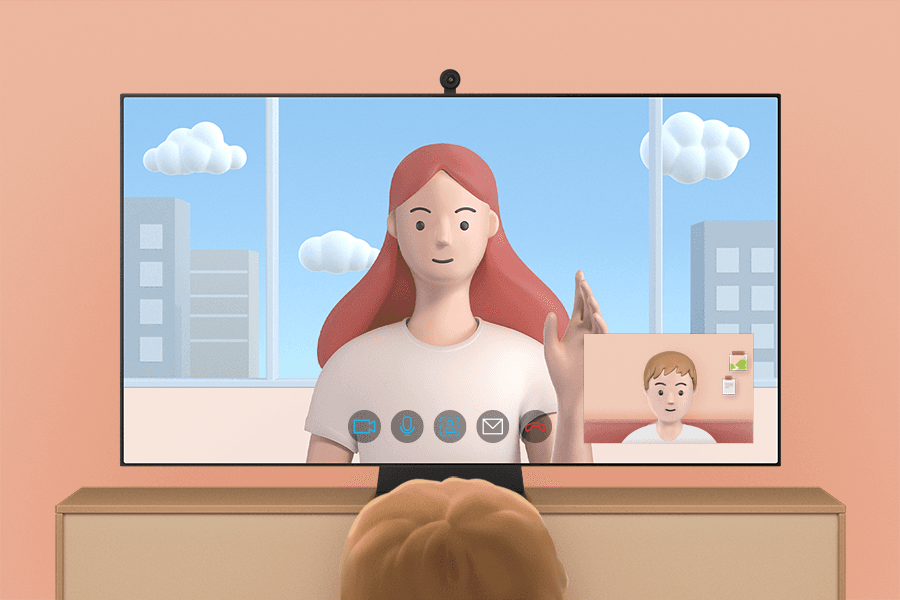 La mère et l’enfant passent un appel vidéo via la TV.